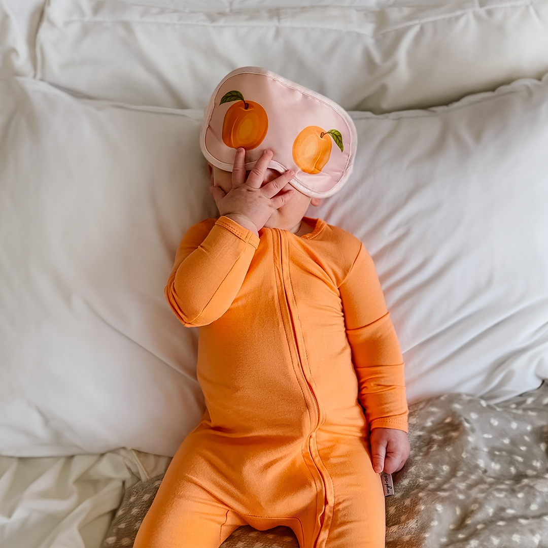 Baby Citrus Conditioner Baby wearing an eye mask